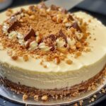 White Chocolate and Ricotta Cheesecake with Biscuit Base and Hazelnut Crumble