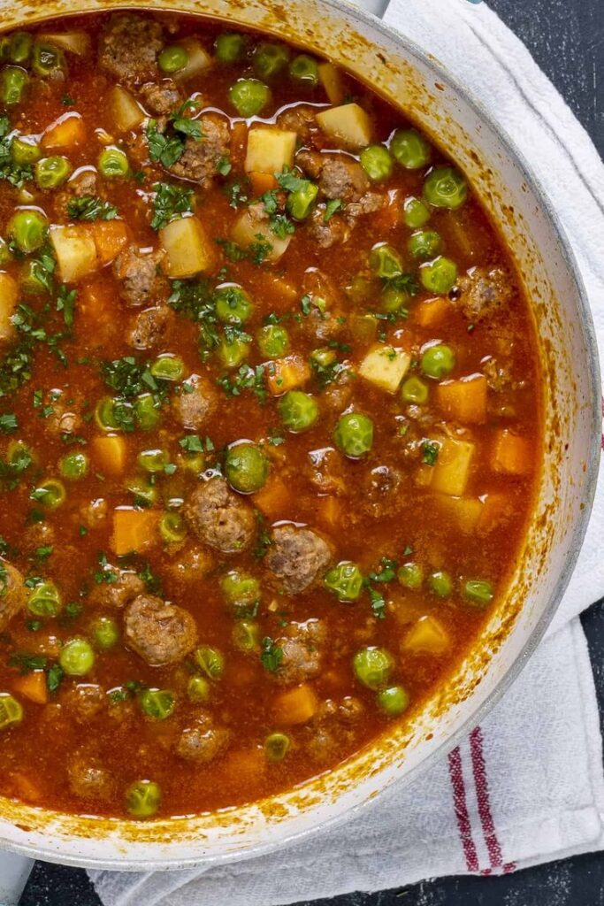 Stewed Meatballs with Carrots and Peas