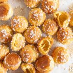 Cream puffs with sugar sprinkles