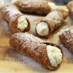 Pastry bags filled with custard and ricotta