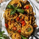 SPAGHETTI WITH ROCKET, CHERRY TOMATOES, CAPERS AND PECORINO