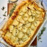 Potato, speck and cheese tart in puff pastry