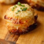 Baked potatoes with raclette cheese and smoked bacon